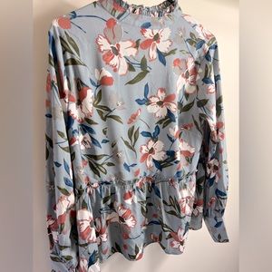 Light blue mock neck floral top